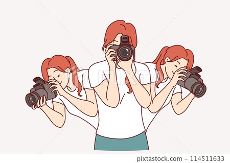 Woman photographer holds camera to create photo reports and looks in different directions 114511633