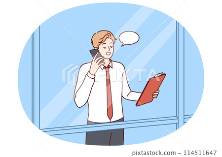 Man head of corporation is talking on phone negotiating, view from behind window skyscraper Man head of corporation is talking on phone negotiating, view from behind window skyscraper 114511647