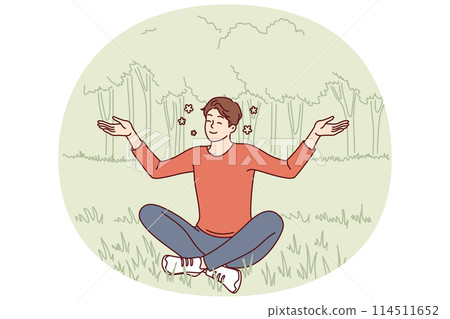 Young guy sits in lotus position on lawn doing yoga and meditating to restore strength Young guy sits in lotus position on lawn doing yoga and meditating to restore strength 114511652