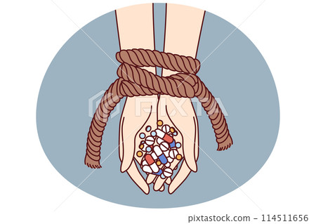 Hands of connected person with antibiotics and psychotropic drugs as metaphor for addiction Hands of connected person with antibiotics and psychotropic drugs as metaphor for addiction 114511656