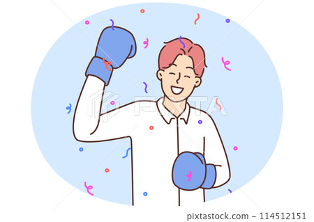Man in boxer gloves celebrate win 114512151