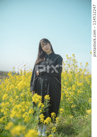 Rape flower field and woman 114512247