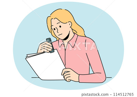 Female secretary stapling paperwork in office 114512765