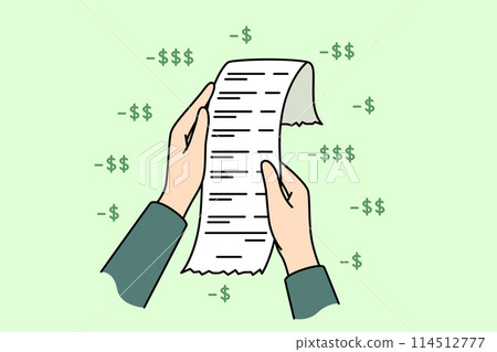 Payment receipt in hands of person detailing costs of shopping or dining at restaurant 114512777