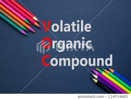VOC volatile organic compound symbol. Concept words VOC volatile organic compound on paper. Beautiful black background. Colored pencils. Business VOC volatile organic compound concept. Copy space. 114514663