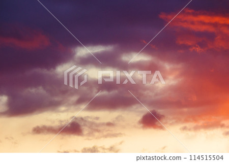red clouds on the sky at dusk. dramatic nature background. weather change before the rain 114515504