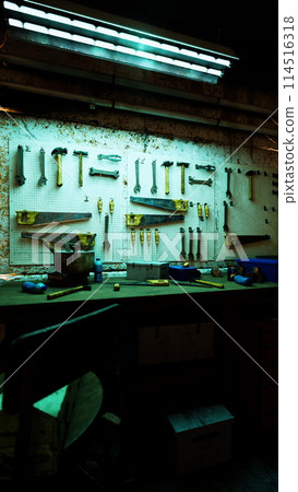 Array of Tools Hanging in Old Auto Repair Shop 114516318