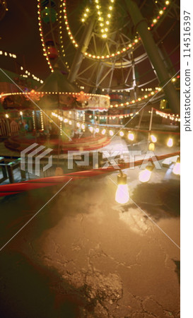 Vibrant Carnival Ride Illuminated at Night Vibrant Carnival Ride Illuminated at Night 114516397
