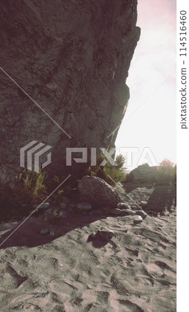 Rock Formation Among Sandy Terrain Rock Formation Among Sandy Terrain 114516460