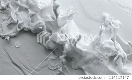 Close-Up View of White Paint Splashes and Swirls Capturing Dynamic Movement Close-Up View of White Paint Splashes and Swirls Capturing Dynamic Movement 114517147