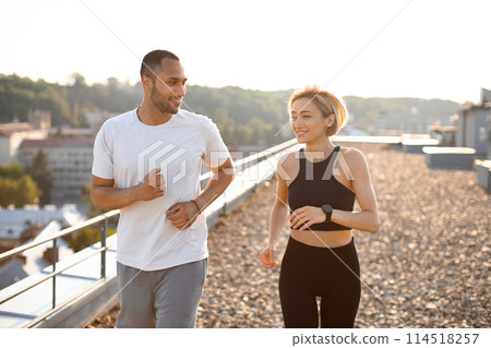Happy sporty couple promotes healthy lifestyle. Happy sporty couple promotes healthy lifestyle. 114518257