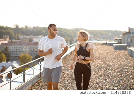 Happy sporty couple promotes healthy lifestyle. Happy sporty couple promotes healthy lifestyle. 114518258