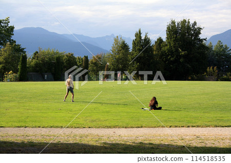 Big green lawn in Vancouver park. British Columbia, Canada Big green lawn in Vancouver park. British Columbia, Canada 114518535