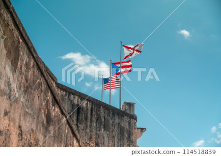Flags at Castillo San Cristobal -fort, castle- in Old San Juan in Puerto Rico Flags at Castillo San Cristobal -fort, castle- in Old San Juan in Puerto Rico 114518839