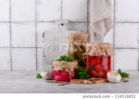 Pickled vegetables in glass jars. Pickled vegetables in glass jars. 114518852