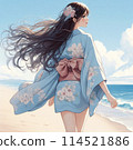 A woman walking on a sandy beach 114521886