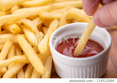 Eat french fries with ketchup Eat french fries with ketchup 114522004