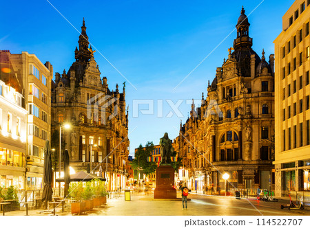 Evening view of Leysstraat street in Antwerp and statue of David Teniers Younger 114522707