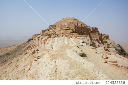 Ksar Guermessa located under the peak of Ras Oum Moutmana, Tunisia Ksar Guermessa located under the peak of Ras Oum Moutmana, Tunisia 114522836