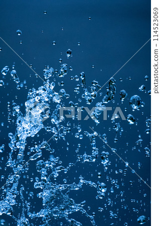 Blue splashes in vertical composition Blue splashes in vertical composition 114523069
