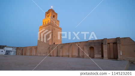 Evening view of minaret of Great Mosque of Kairouan, Tunisia Evening view of minaret of Great Mosque of Kairouan, Tunisia 114523201