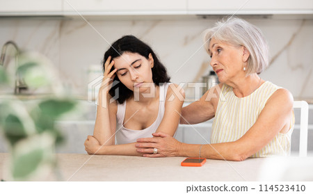 Elderly woman apologizes to young woman after quarrel Elderly woman apologizes to young woman after quarrel 114523410