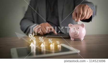 Businessman with inflation money with falling financial graph Grocery stores due to financial crisis, food costs Businessman with inflation money with falling financial graph Grocery stores due to financial crisis, food costs 114523896