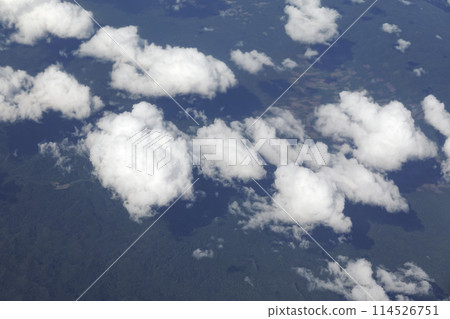 View from an airplane window to see the sky and white cloud View from an airplane window to see the sky and white cloud 114526751