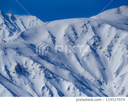 Snow-covered mountain ridges, ridgelines, Northern Alps 114527074