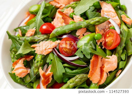 smoked salmon salad with spring veggies in bowl smoked salmon salad with spring veggies in bowl 114527393