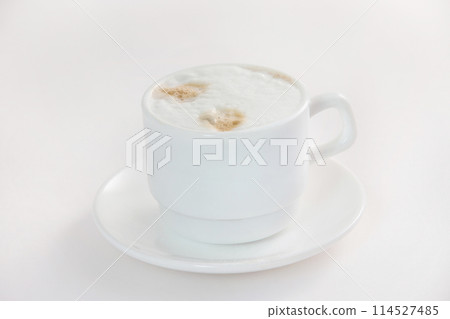 Closeup image of hot cup of coffee with milk isolated at white background. 114527485