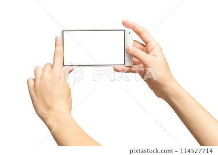 Mockup of female hands holding frameless cellphone with blank screen and making selfie at isolated background. Mockup of female hands holding frameless cellphone with blank screen and making selfie at isolated background. 114527714