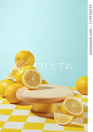 An empty wooden platform placed in center of yellow table with checkered pattern for presenting product, many fresh lemon arranged around. Photo for promotion, blank space for adding text An empty wooden platform placed in center of yellow table with checkered pattern for presenting product, many fresh lemon arranged around. Photo for promotion, blank space for adding text 114530315