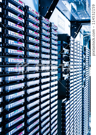 data storage tapes in tall stacks - internet cloud concept 114532159