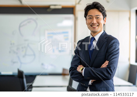 Asian male business person paving the way to the future 114533117