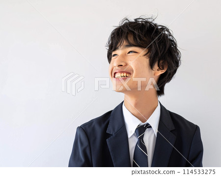 Asian student looking towards a hopeful future 114533275