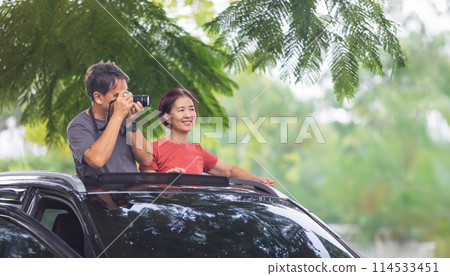 Senior couple driving car travel after reired. 114533451