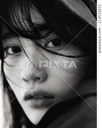 Monochrome moment: facial expression of a young Japanese woman 114533615