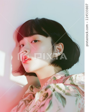 Natural beauty of an Asian woman against a simple background 114533807
