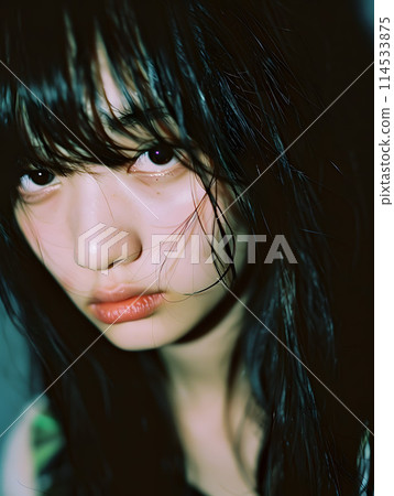 Portrait of an Asian woman with wet hair 114533875