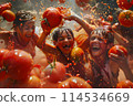 Celebrating La Tomatina with tomatoes. 114534669