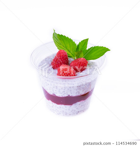 chia pudding with raspberry sauce, granola and fresh raspberries on rusic background 114534690