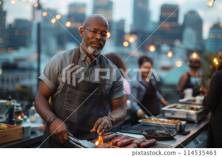 Urban rooftop barbecue party at sunset 114535463