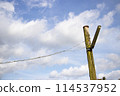 Old-fashioned wooden electric pole and sky 114537952