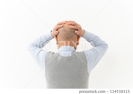 Senior man headache back view 114538315