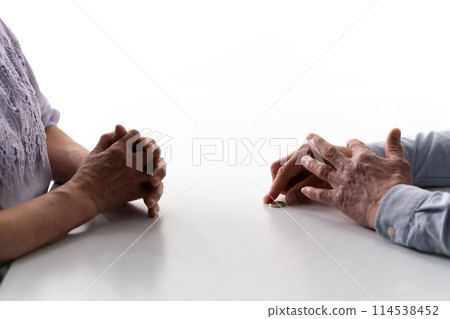 Senior couple, discussion, hand, ring Senior couple, discussion, hand, ring 114538452