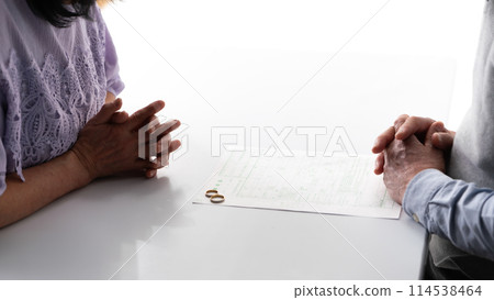 Senior couple divorce papers 114538464