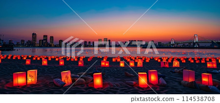 Warm hues of sunset sky blend with the cityscape and illuminated paper lanterns on the beach, commemorating Marine Day with a picturesque seascape. Japanese Umi no Hi known as Ocean Day or Sea Day 114538708