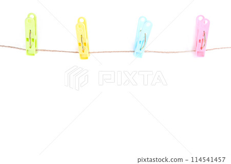 Colorful clothes pins on rope isolated on white 114541457