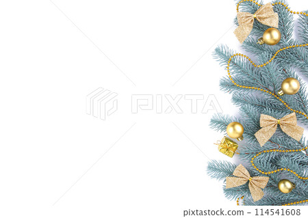 Fir tree branches with christmas decoration on a white background 114541608